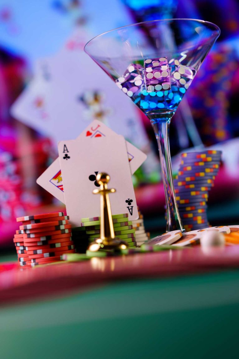 cocktail-glass-on-the-casino-gambling-table-2023-11-27-04-50-38-utc